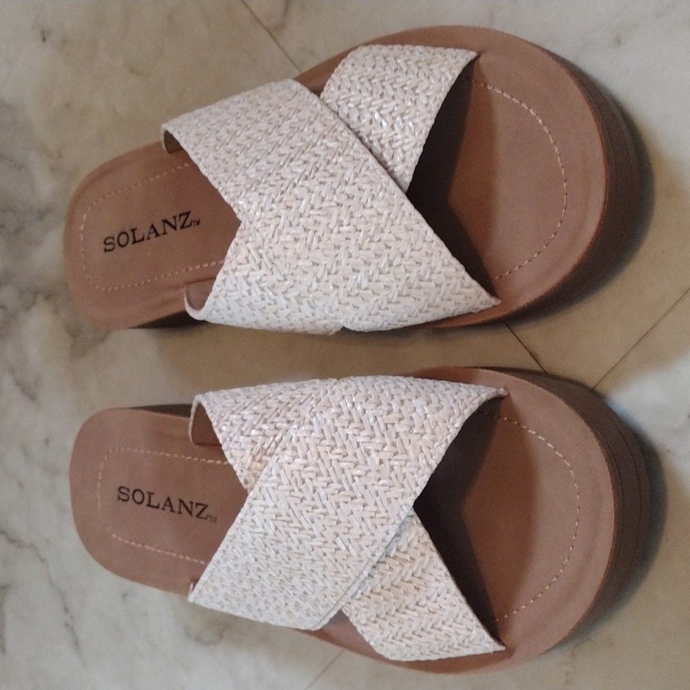 Solanz slide on sandals.